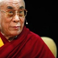 His Holiness the Dalai Lama listens at the “Wisdom and Compassion for Challenging Times” event in New York May 3, 2009.Photo: Reuters/Eric Thayer.