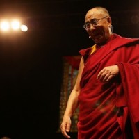 His Holiness the Dalai Lama speaks at the Vector Arena on 5 December 2009 in Auckland, New Zealand. His Holiness the 14th Dalai Lama of Tibet is visiting New Zealand conducting Public teachings to New Zealanders/Getty Images