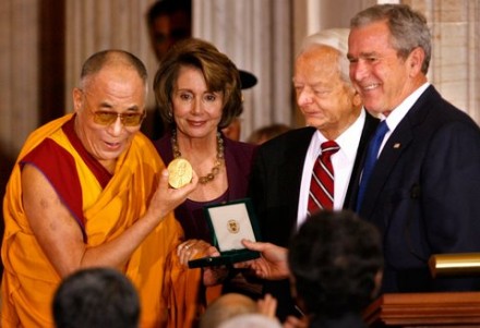  File photo of His Holiness the Dalai Lama receiving the US Congressional Gold Medal from President Bush, House Speaker Nancy Pelosi Sen. Robert Byrd, during a ceremony 17 October 2007 in the Capitol (Tim Sloan/AFP/Getty Images)