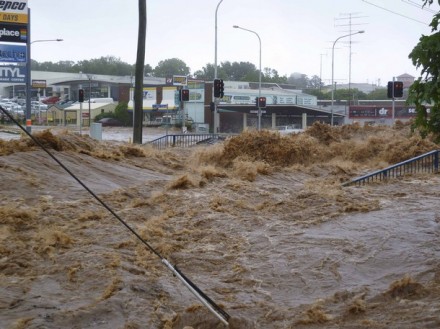 A street is covered by a flash flood in Toowoomba, Queensland 10 January 2011. Residents in