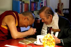 His Holiness the Dalai Lama greeting former Czech President Vaclav Havel in Prague on December 10, 2011. 