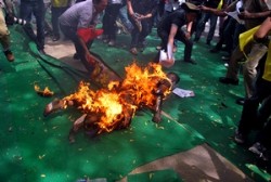 Jamphel Yeshi, a Tibetan youth living in New Delhi set his body on fire at a mass protest at Jantar Mantar in the Indian capital demanding international intervention in the ongoing crisis in Tibet on March 26, 2012. (Phayul photo/Norbu Wangyal)